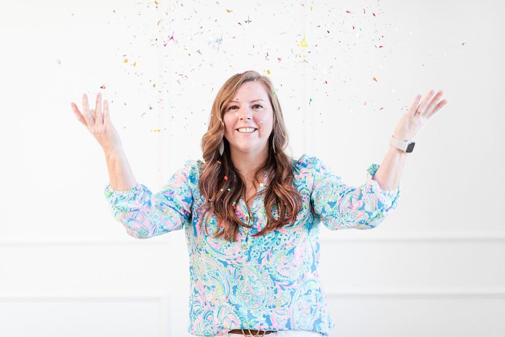 a fun photo of Melissa Arlena throwing confetti in the air