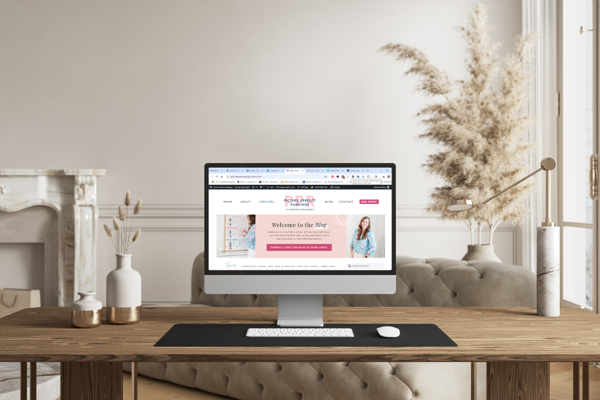 a laptop computer sitting on a desk showing PPR blog website