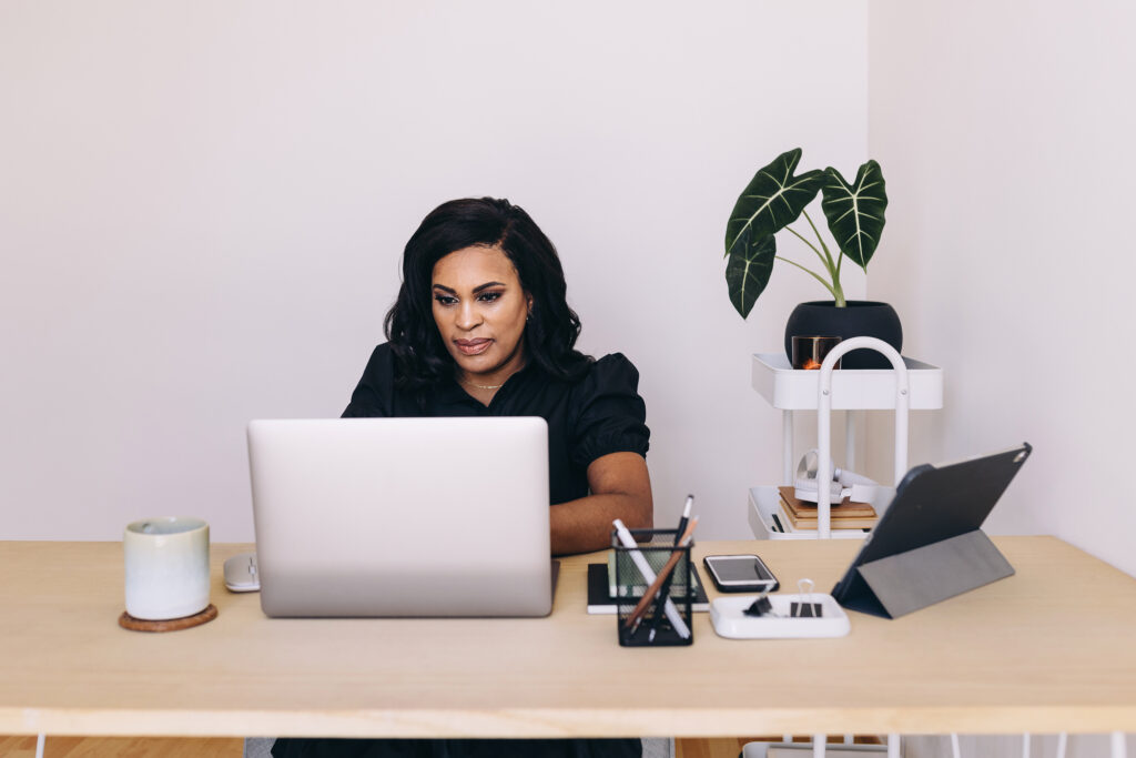 photographer looking at a photography website redesign seo checklist