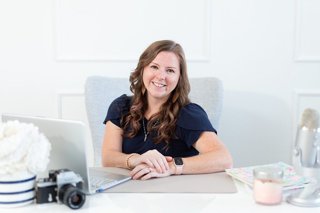 Melissa sits at her desk and shares her seo tips for photographers looking for new websites